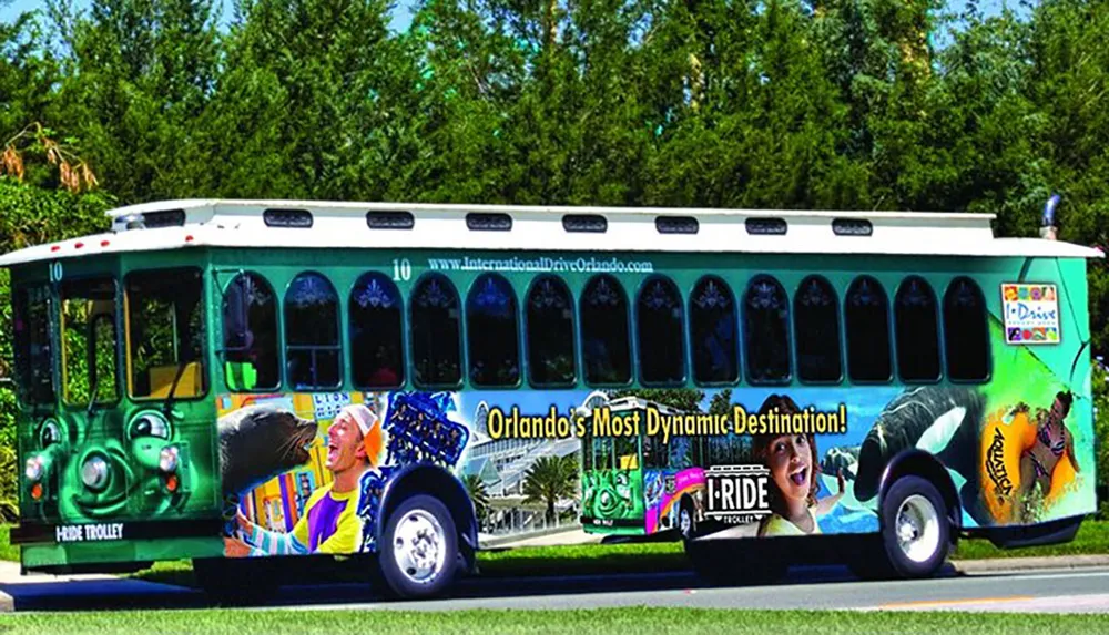 The image shows a colorful trolley bus with advertising and images promoting Orlando as a dynamic destination for tourism