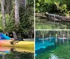 Four people are smiling and posing with their paddles in clear kayaks on a calm transparent waterway amidst lush greenery