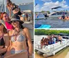 A group of cheerful people are enjoying a sunny day on a boat with drinks laughing and taking photos