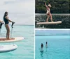 A man and a woman paddleboarding on a calm clear ocean