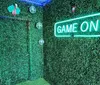 This image depicts a dark classroom with the words CLASSROOM CONSPIRACY in bold partially obscured text superimposed over the scene creating a mysterious or dramatic atmosphere