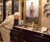 A family is enjoying a visit to a quirky exhibition featuring unusual taxidermy with an inset photo of a person dressed as a cowboy in a Western-style setting
