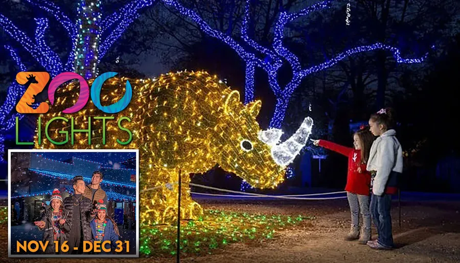 The image shows an advertisement for a Zoo Lights event, featuring a large, illuminated rhinoceros-shaped light display being admired by two children, with a smaller inset photo showing three smiling individuals wearing festive hats against a backdrop of blue lights.