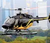 A black and yellow helicopter is flying in front of a city skyline backdrop with skyscrapers possibly on a surveillance or transport mission