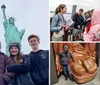 Three people are posing for a photo in front of the Statue of Liberty on an overcast day