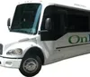 The image shows a white shuttle bus with the word OnBoard printed on the side